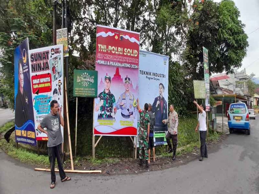 Pasang Spanduk Himbauan Guna Wujudkan Pemilu Damai