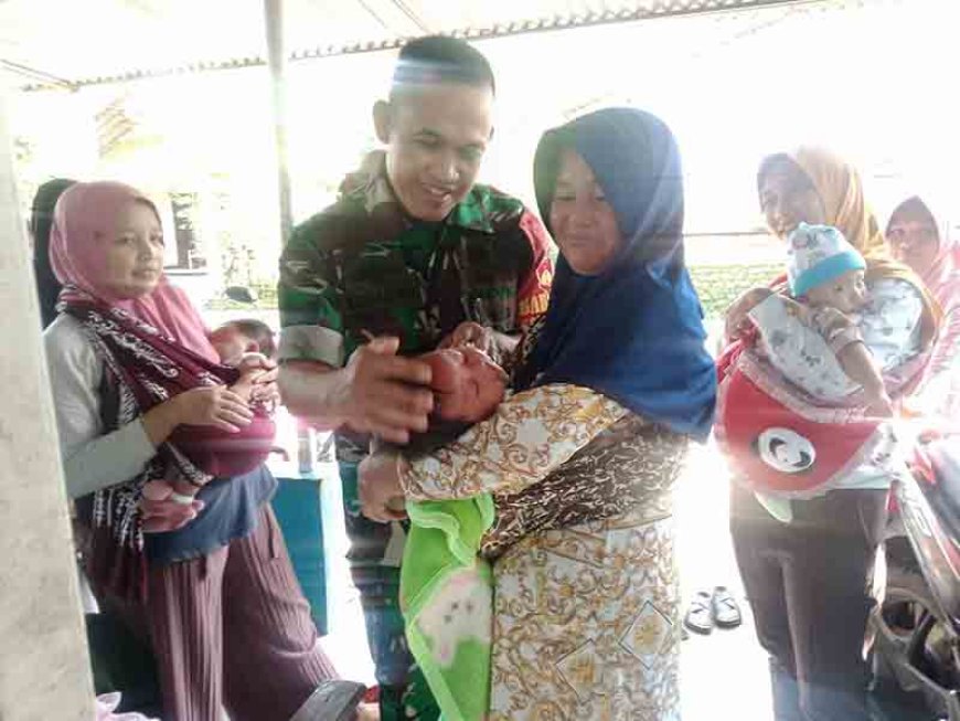 Dukungan TNI dan Bidan Desa untuk Pencegahan dan Penanganan Gizi Buruk pada Balita dan Ibu Hamil