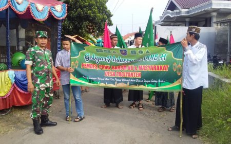 Babinsa Adiwerna Monitoring Dan Pengamanan Karnaval Gebyar Muharrom 1445 H
