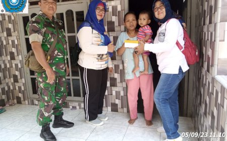 Babinsa Kodim 0712 Tegal Dampingi Ibu Ibu PKK Beri PMT Untuk Anak Stunting