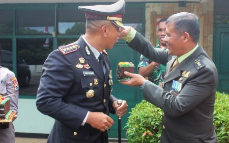 Polresta Jayapura Kota Serbu Kodim Jayapura Berikan Kejutan HUT TNI