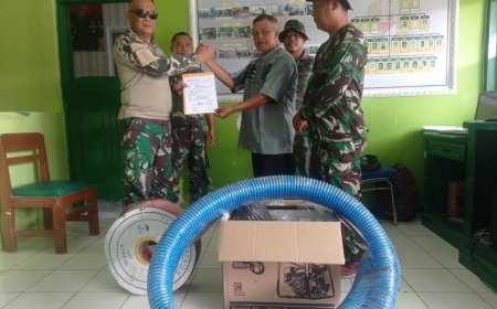 Danramil Pangkah Serahkan Bantuan Pompa Air Kepada Anggota Kelompok Tani