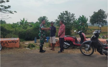 Babinsa Koramil Lebaksiu Cek Saluran Irigasi