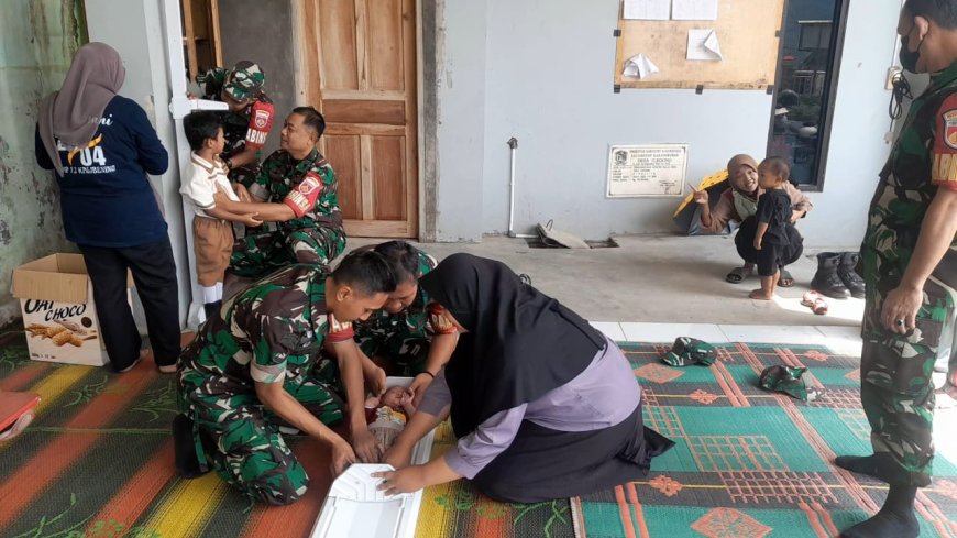 Wujudkan Balita Sehat Babinsa Koramil 04 Karangkobar Dampingi Posyandu