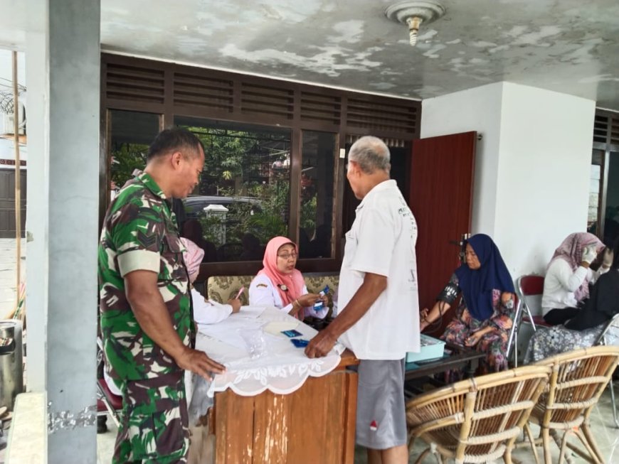 Babinsa Koramil Tegal Selatan Damping Posyandu Balita