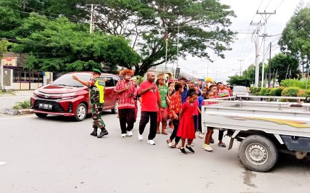 Babinsa Sentani Amankan Jalan Santai Jemaat GKI Onomi Flavouw dalam Rangka Pekabaran Injil ke-170 di Tanah Papua