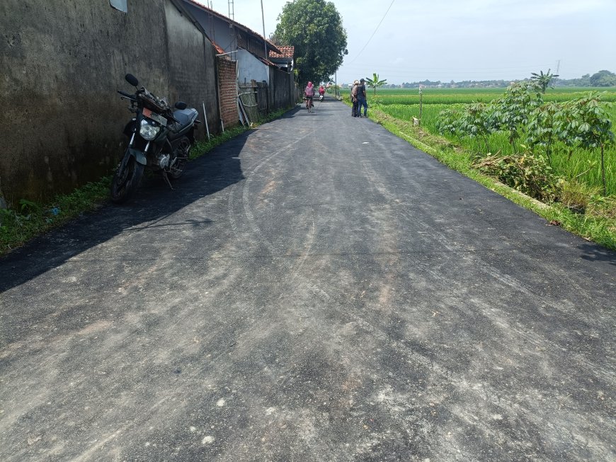 Sasaran Fisik Berupa Pengaspalan Jalan Sepanjang 786 M Telah Selesai