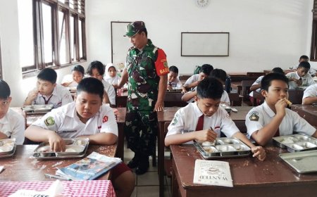 Program MBG, Babinsa Pastikan Paket Gizi Tersalur ke Ribuan Siswa
