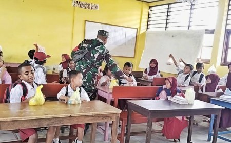 Babinsa Arso Dampingi Penyaluran 1.868 Porsi Program MBG