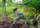 Prajurit Yonif TP 860/NSK dan Warga Kompak Jumat Bersih Bangun Drainase Cegah Banjir