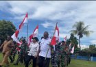 Semarak Patriotisme di Bumi Sarmi: Yonif TP 809/NTM Bersama Elemen Masyarakat Gelar Kirab Merah Putih