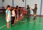Senyum Anak Desa Warnai TMMD Satgas Bagikan Peralatan Olahraga di Gumelem Kulon