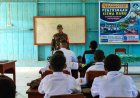 Babinsa Airu Bakar Semangat Disiplin Siswa Baru di Perbatasan Papua