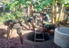 Buis Beton Sumur Galian, Mulai Dipasang Oleh Personel Satgas TMMD ke-129 di Wanam