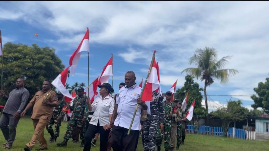 Semarak Patriotisme di Bumi Sarmi: Yonif TP 809/NTM Bersama Elemen Masyarakat Gelar Kirab Merah Putih
