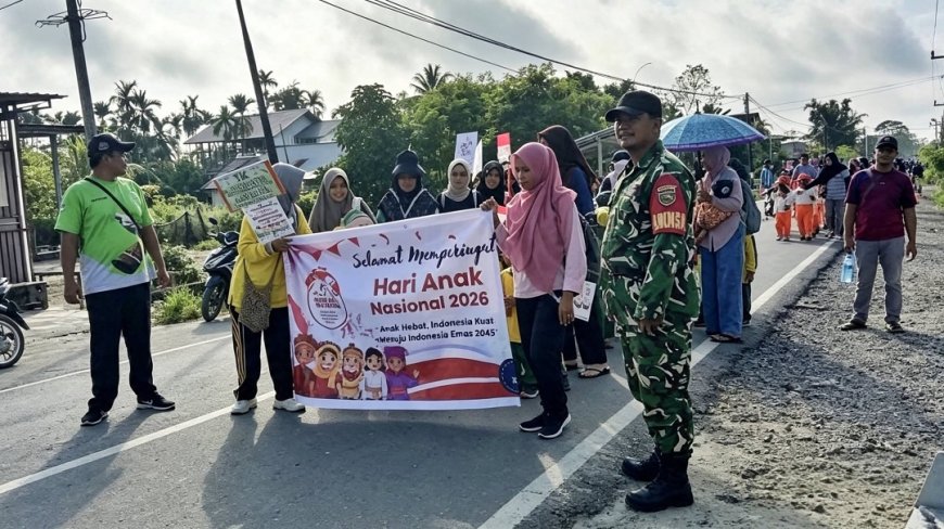 Babinsa Skanto Kawal Jalan Santai Hari Anak Nasional Tanamkan Semangat Generasi Emas 2045