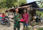 Mempererat Tali Persaudaraan di Ujung Timur Nusantara, Yonif TP 809/NTM Bagikan Bendera Merah Putih untuk Warga Sarmi