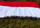 Momen Kemerdekaan! Bendera Merah Putih Raksasa Dibentangkan di Dua Distrik Kabupaten Tolikara