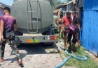 Prajurit Yonif TP 860/NSK Salurkan Bantuan Air Bersih untuk Warga Kampung Uri yang Terdampak Kekeringan