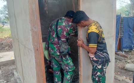 Plester Dinding MCK Dikebut, Satgas TMMD ke-129 Pastikan Program Pembangunan di Wanam Terus Berjalan