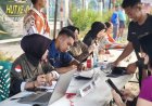 Ditengah Keramaian CFD Masyarakat Nabire Hadir Pelayanan Cek Kesehatan Gratis Dari Tim Kesehatan Yonif TP 804/DBAY