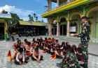 Prajurit Yonif TP 860/NSK Mengajar dengan Hati, Tanamkan Disiplin dan Cinta Tanah Air kepada Siswa MI At Taqwa Waropen