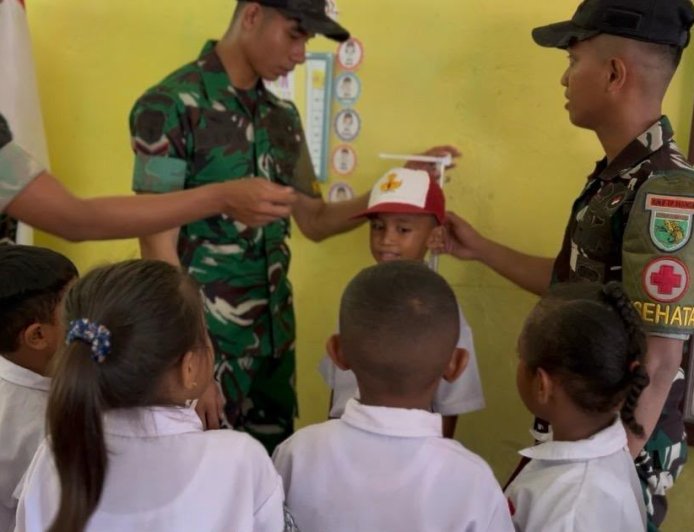 Yonif TP 860/NSK Gelar Pemeriksaan Kesehatan Gratis bagi Siswa SD Inpres Waren