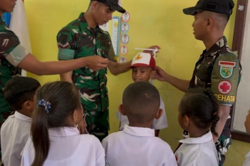 Yonif TP 860/NSK Gelar Pemeriksaan Kesehatan Gratis bagi Siswa SD Inpres Waren